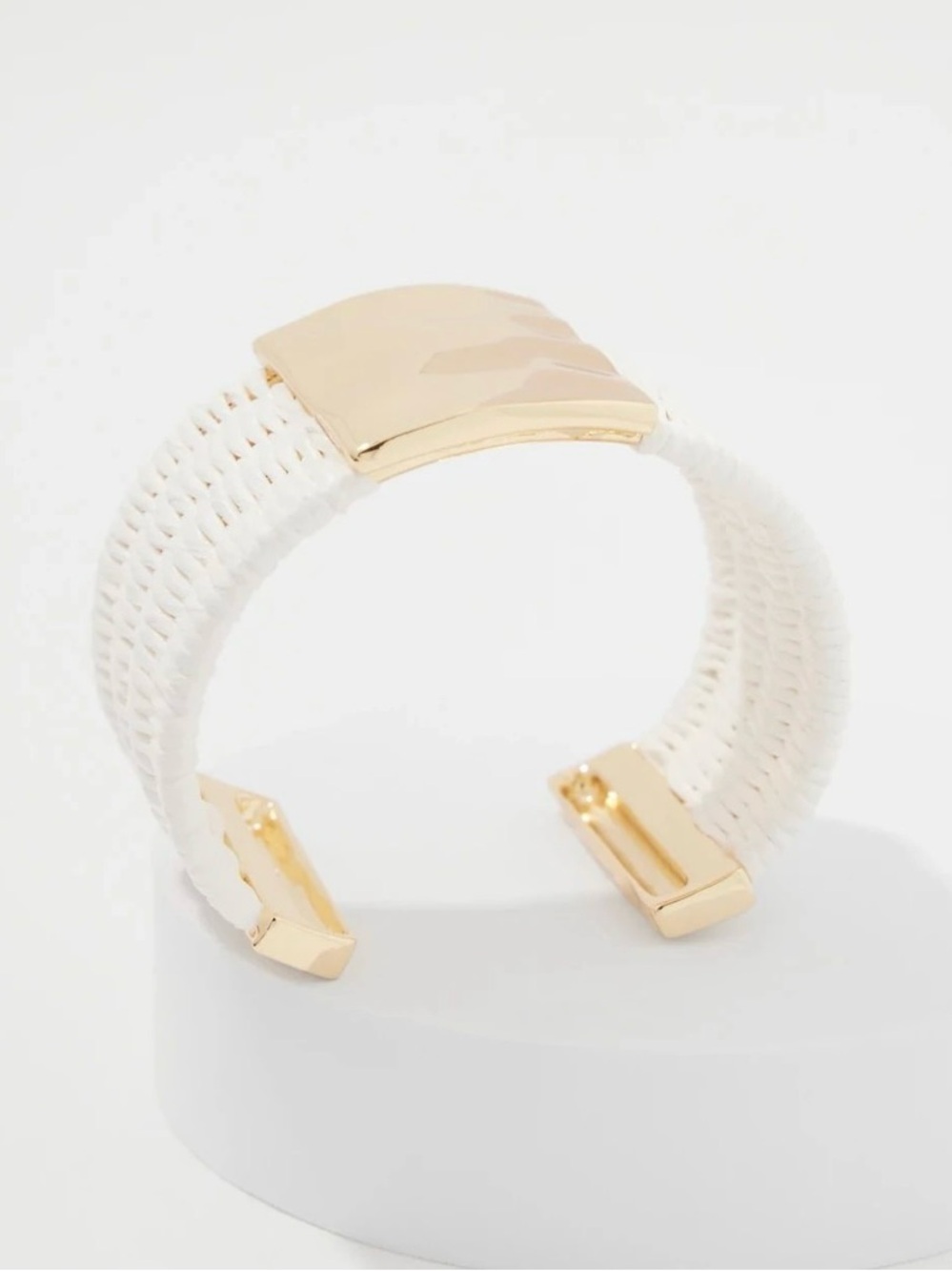 1 WHBM Ecru Raffia + gold cuff
1 gold Bangle bracelet.